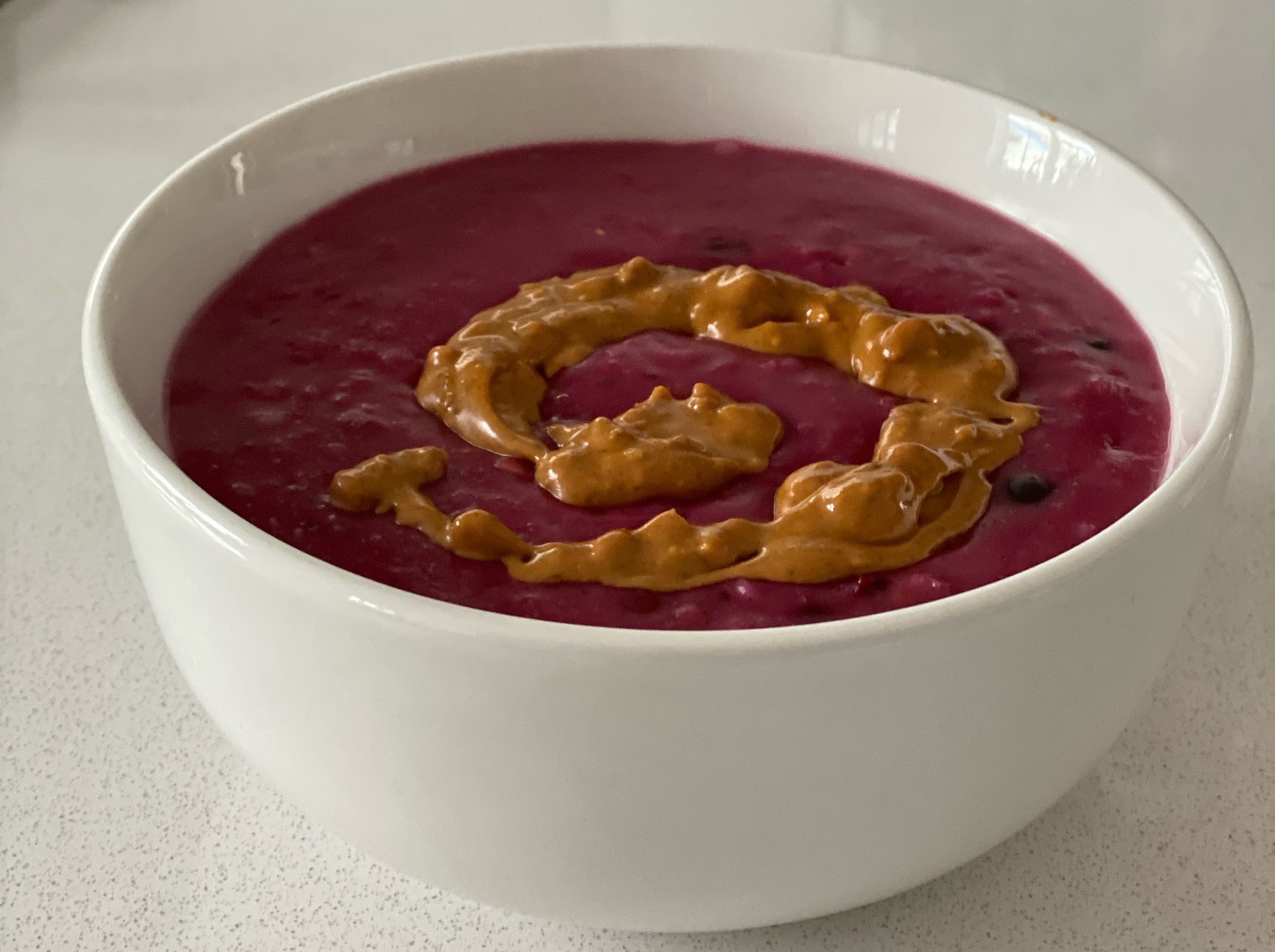 Berry and peanut butter porridge