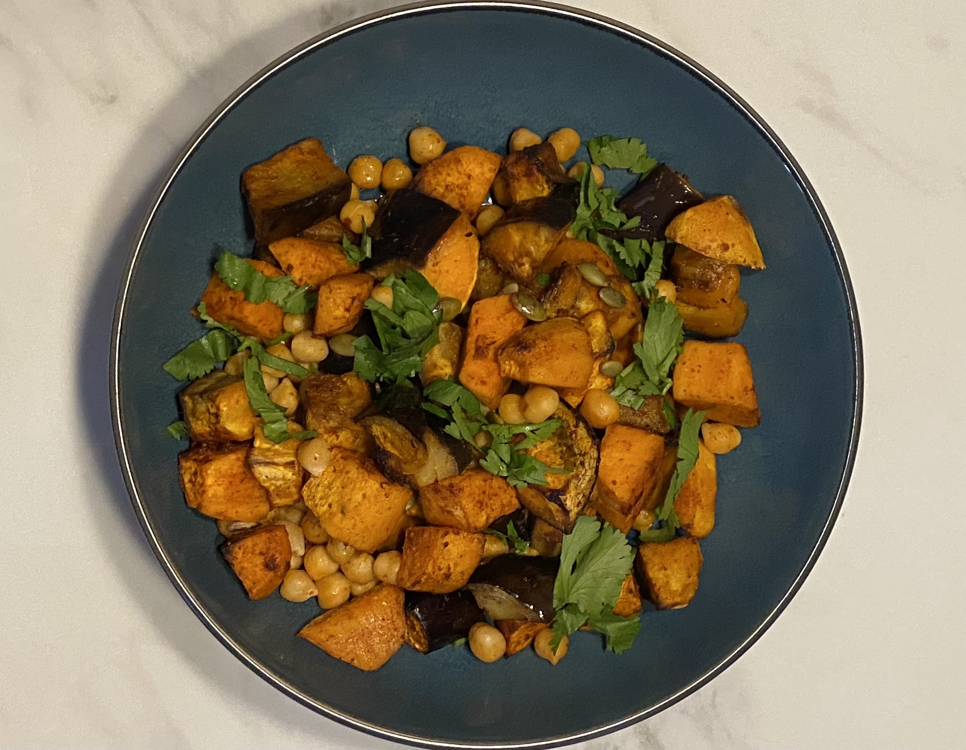 Harissa aubergine, sweet potato and chickpea traybake