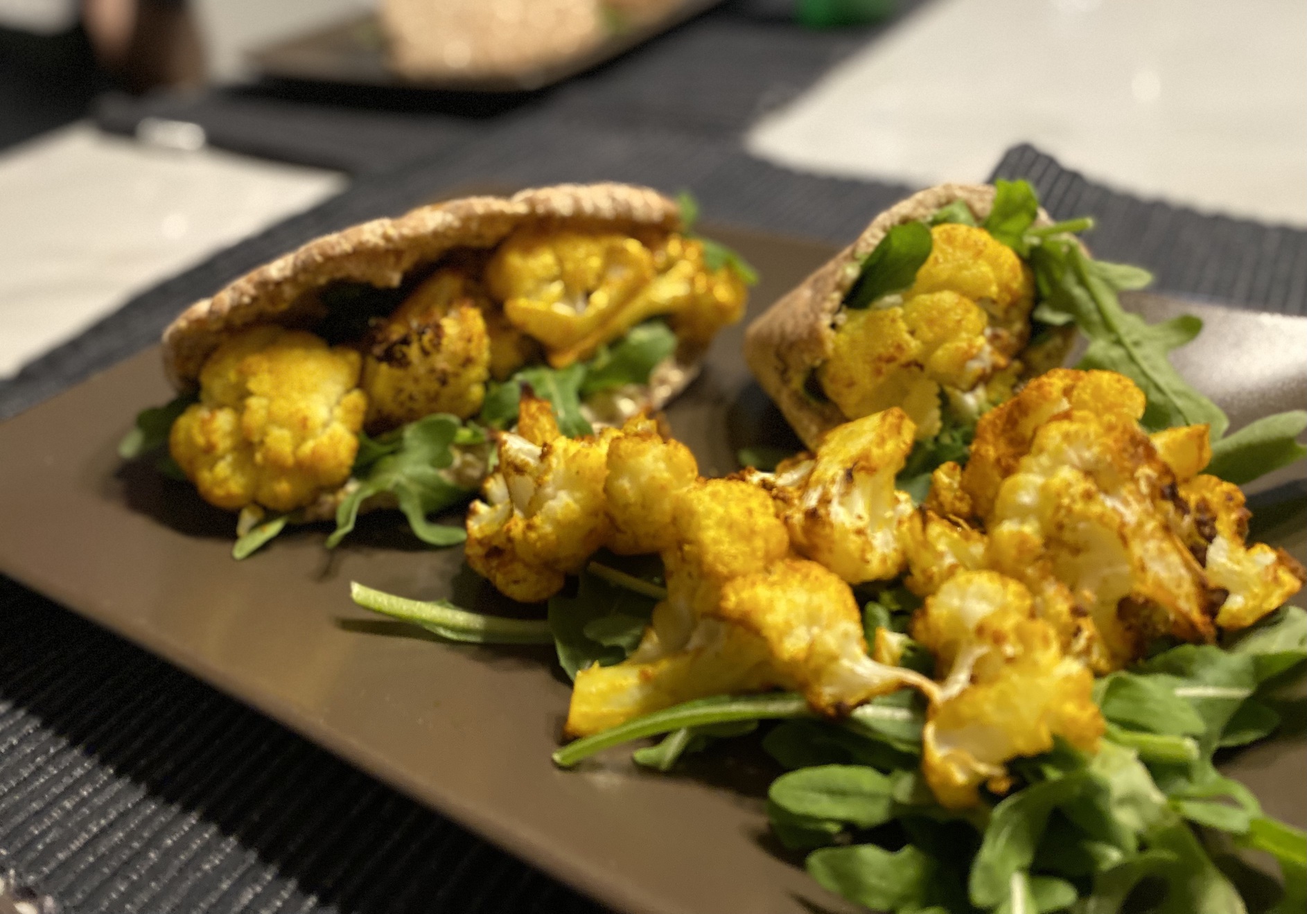 Roasted cauliflower and hummus pittas