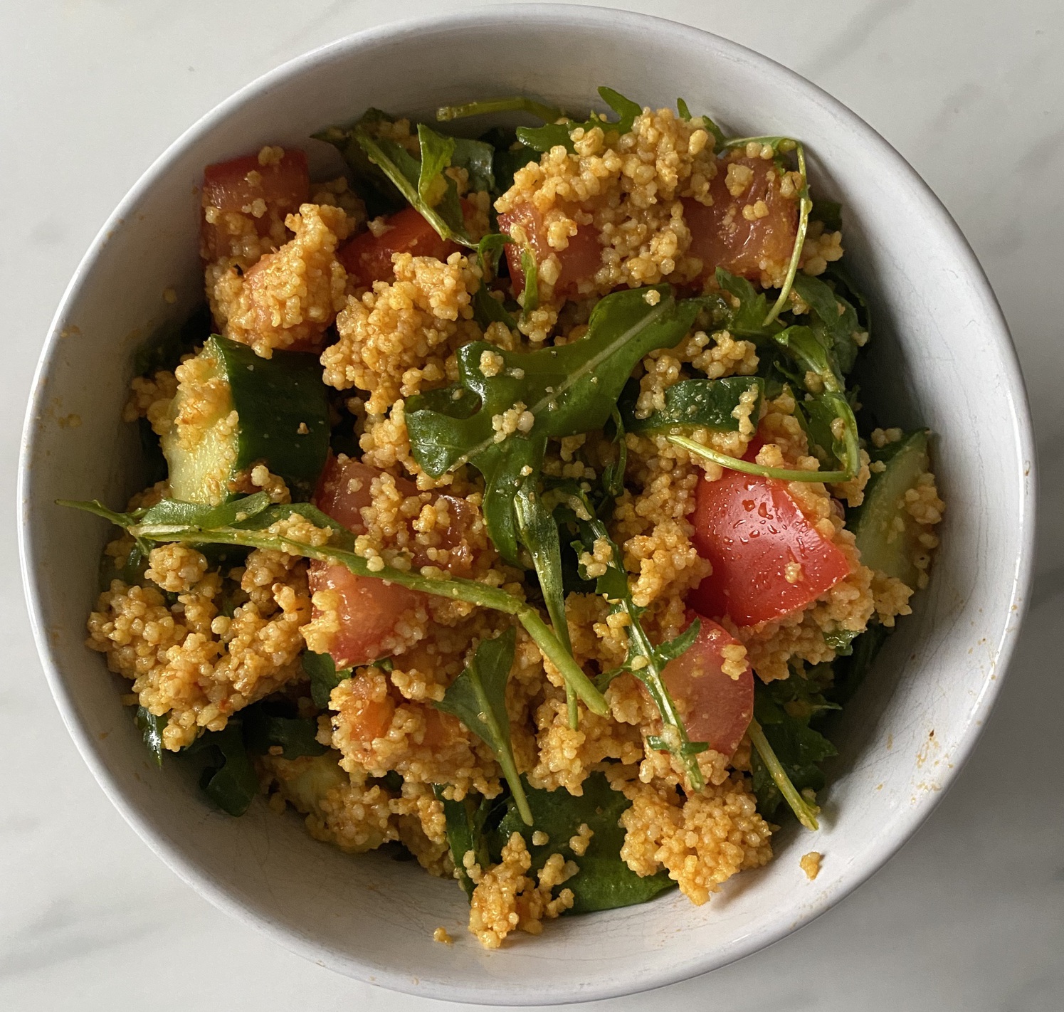 Rocket and tomato couscous salad