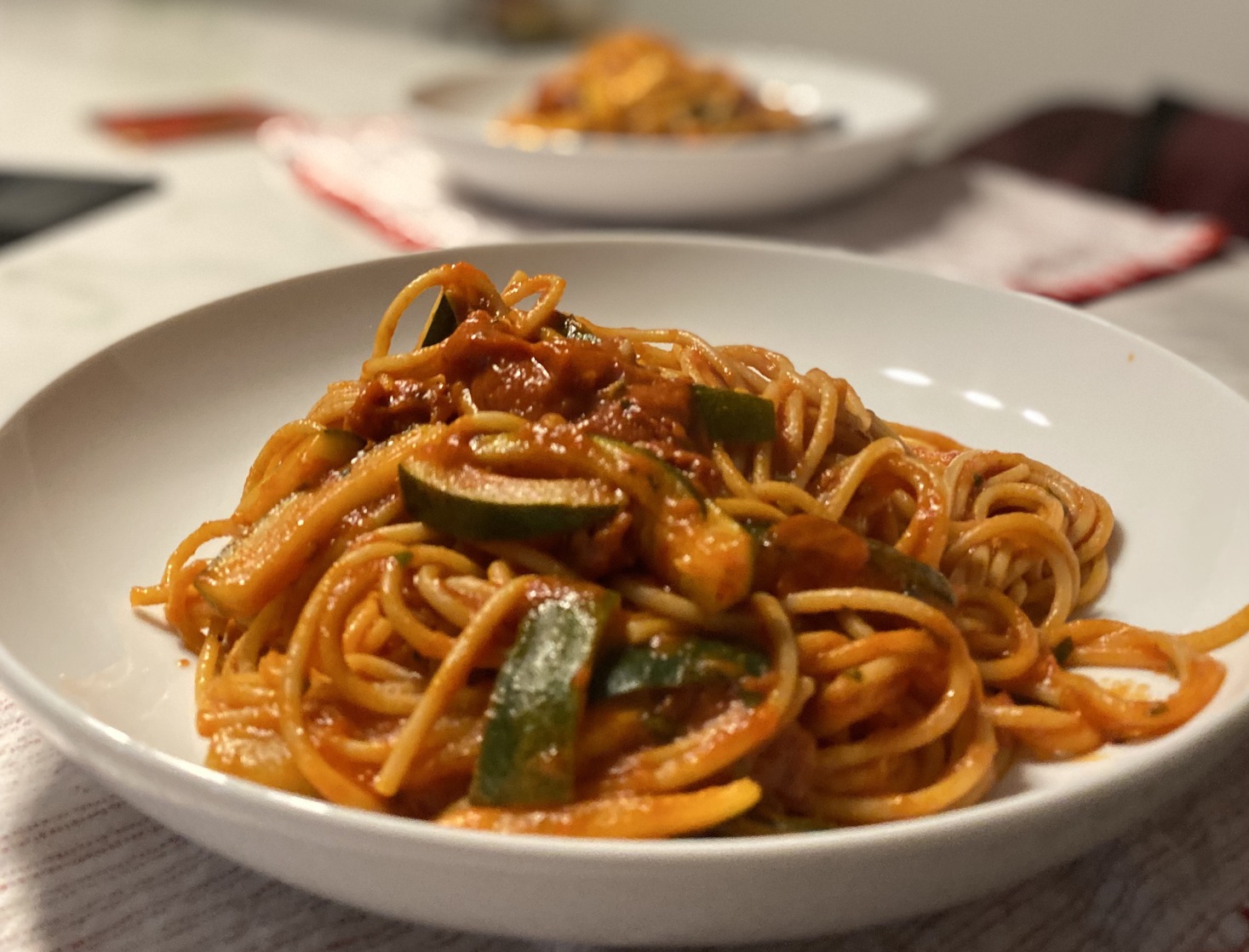 Spaghetti with courgette and sun-dried tomato sauce