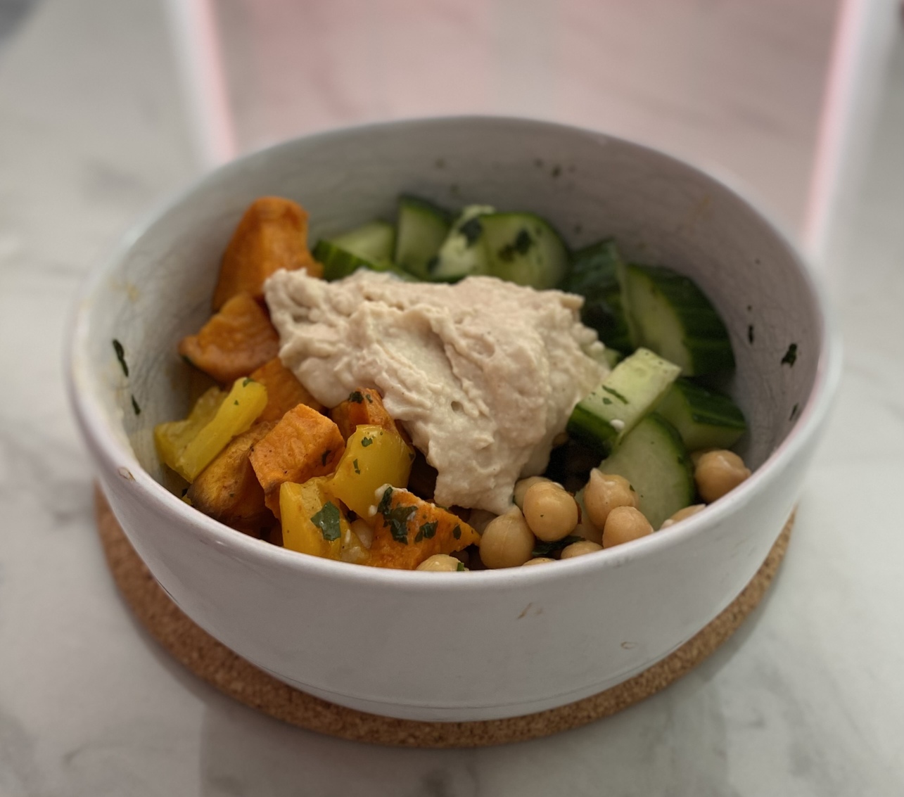 Sweet potato and hummus salad bowl